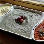 Trittico multicolore: spuma di senape, crema di melanzane e Tahina, crema rossa alle olive nere